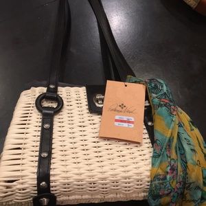 New with tags Patricia Nash wicker basket style purse natural with black trim.